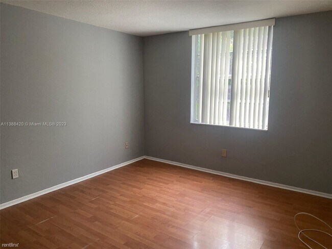 Building Photo - 2 br, 2 bath Condo - 8301 SW 142nd Ave Apt...