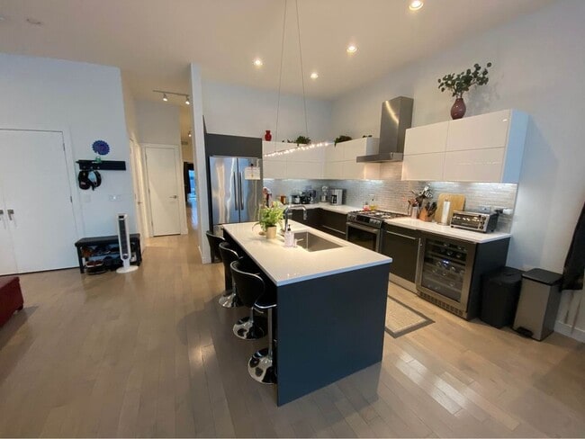 The kitchen includes a wine fridge - 1708 N Damen Ave