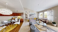 Located at 4650 N Rainbow Blvd in Las Vegas, NV, this two-story, 2-bedroom, 2-bathroom residence offers a well-designed layout across two levels. The main living floor is generously proportioned and centers around an open-concept space that seamlessly integrates the living room, dining area, and kitchen. The living room features neutral-toned carpet, large windows, and a door leading out to a private balcony, filling the space with natural light and outdoor views. The kitchen is outfitted with rich wood cabinetry, granite-style countertops, hardwood-style flooring, and a range with ample storage throughout. A dedicated dining area sits adjacent to the kitchen, ideal for everyday meals. Both bedrooms are comfortably sized, carpeted, and equipped with built-in closets offering shelving and hanging storage. The primary bedroom features large windows that invite natural light. The two full bathrooms each include a soaking tub and shower combination, wood-style flooring, granite-topped vanities, and generous mirror space. Additional highlights include a den, a utility room, in-unit laundry, two closets, a hallway, and carpeted staircases connecting the entry level to the main living floor, completing this functional and comfortable Las Vegas home.