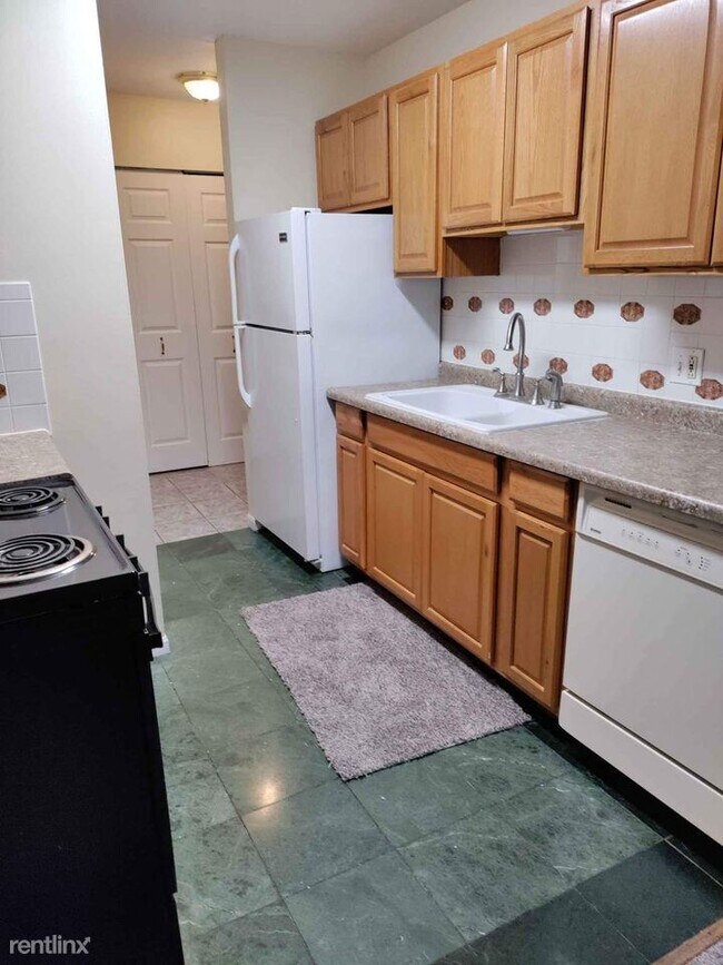 Building Photo - 2 br, 1.5 bath Condo - 1605 Maple Ter Unit 2A