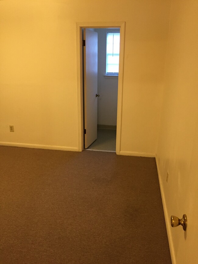 Master Bedroom with entrance to half bath - 3596 Carnes Ave