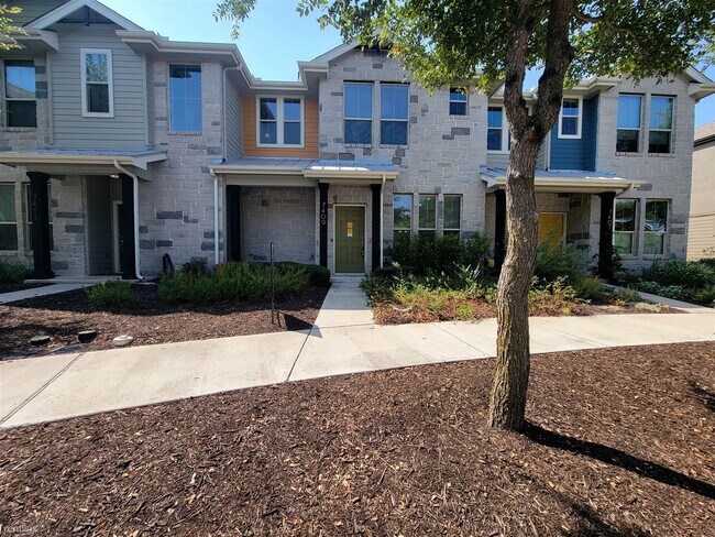 Foto del edificio - 3 br, 2.5 bath Townhome - 7409 Pantherpaw St