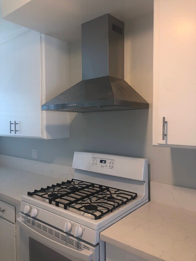 New stove and hood - 7808 W Manchester Ave
