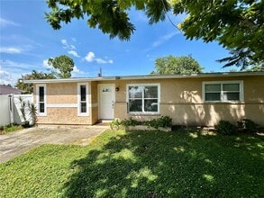 Building Photo - 6821 Onyx Dr N