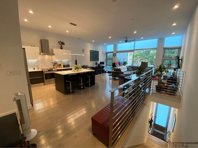Top of the stairs, looking into the kitchen/living room - 1708 N Damen Ave