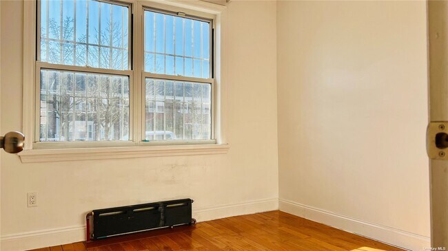 Building Photo - 144-43 69th Rd