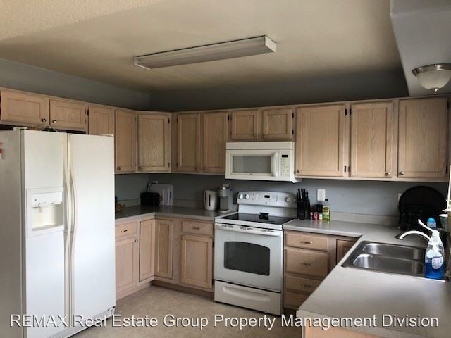 Building Photo - 4 br, 3 bath House - 6705 Bear Tooth Dr.