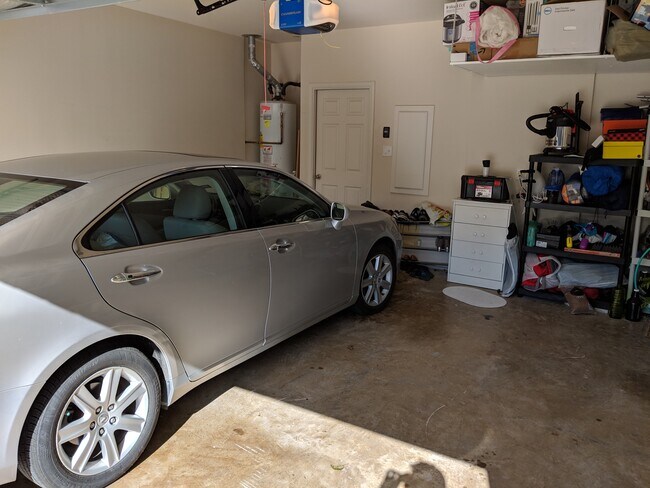 2- Car Garage with plenty of storage space - 8742 Manhattan Avenue Townhome