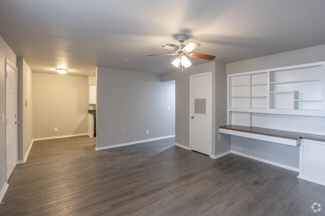 2BR, 1BA - 950SF - Living Room - Emerald Greens