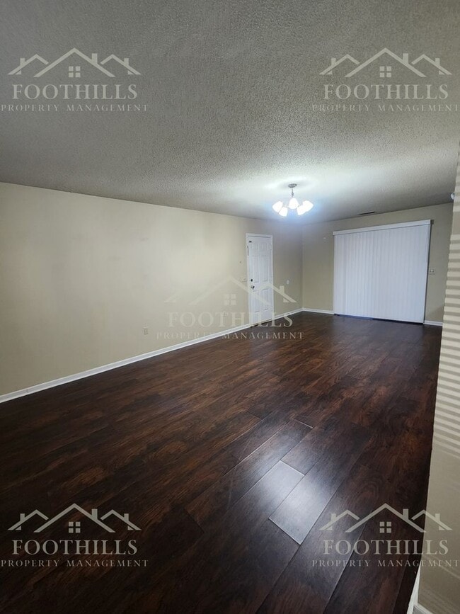 Building Photo - 3-Bed Home with Open Floor Plan and Carport
