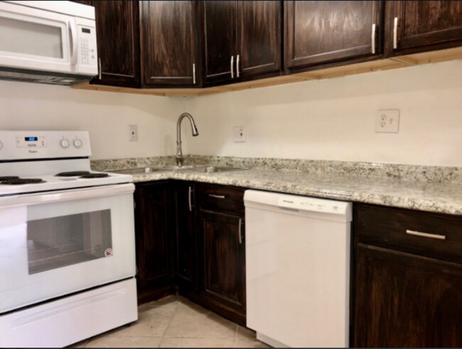 Building Photo - 5001 Tholozan Ave