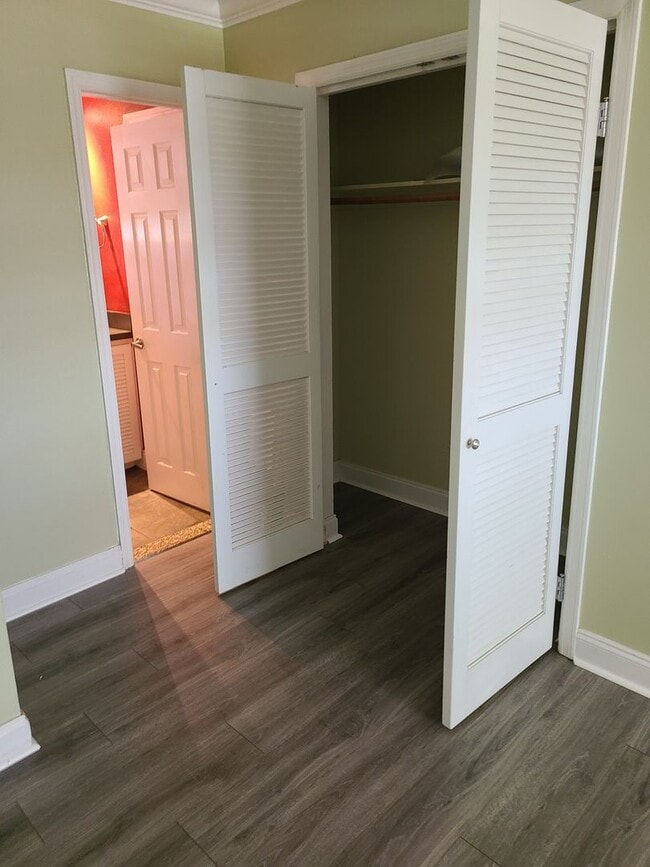 Building Photo - 1.1 New laminate flooring - looks amazing- Community Pool and Laundry facility