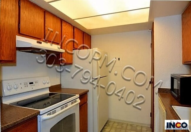 Foto del edificio - Top floor one bedroom condo with carport!!!