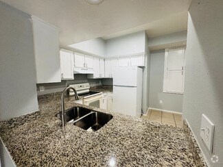 Building Photo - 8731 Village of Fondren