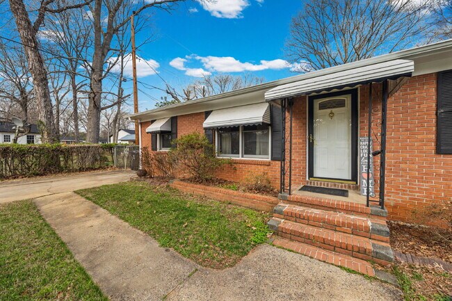 Building Photo - Classic Brick Ranch with 24x24 Workshop, Fenced Yard & Garden Beds