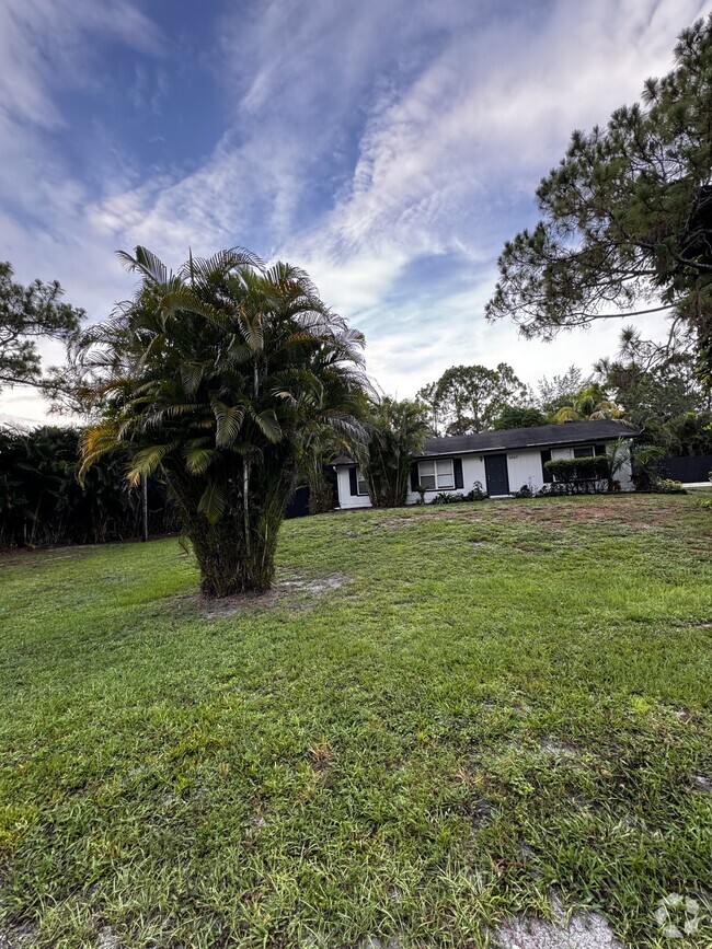 Building Photo - 6669 Royal Palm Beach Blvd