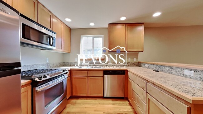 Photo - Charming two-story condo with two master s...