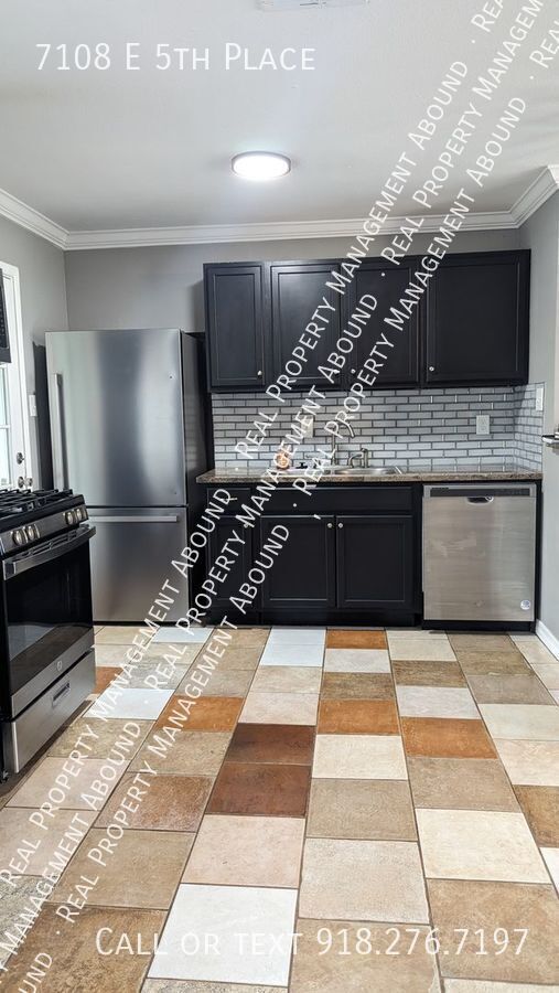Foto del edificio - 7108 E 5th Pl