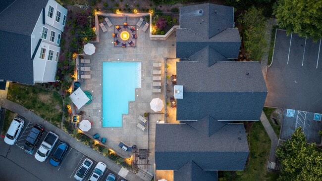 Explore resort style living in a picturesque flat and townhome community - The Timbers at Issaquah Ridge