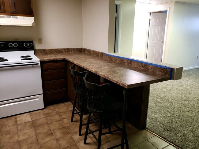Counter with stools open to living room - 898 Duss Ave