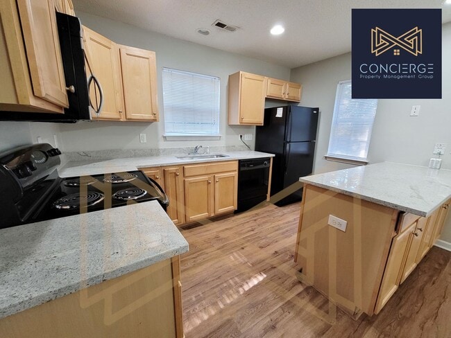 Building Photo - End Unit Townhome In Prime Location