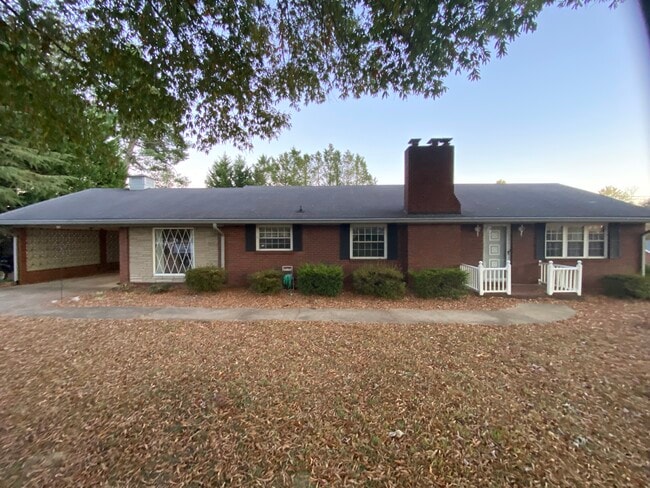 Front of house & carport area - 958 W Clemmonsville Rd