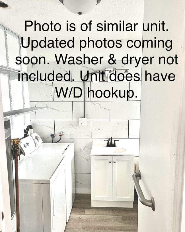 Bathroom with W/D hookup. Does not include washer or dryer. - 1971 Vaughn St