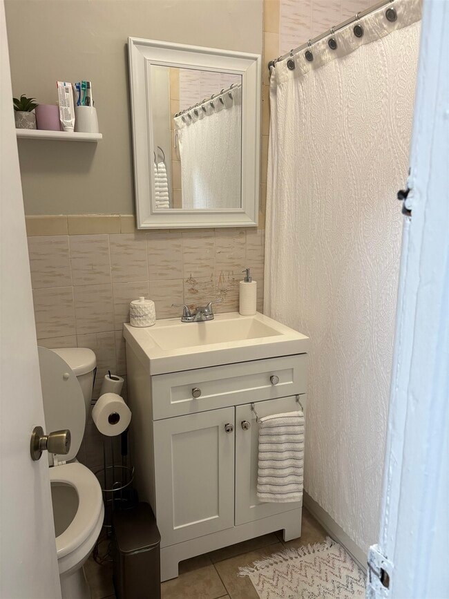 Building Photo - 121-123-123 W 25th St