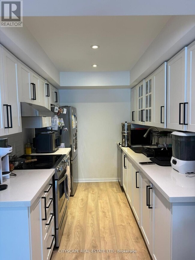 Photo du bâtiment - 4620 Guildwood Way