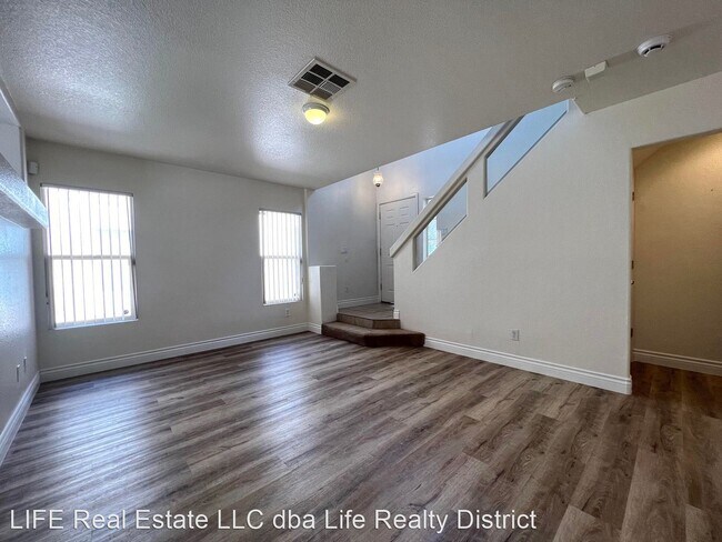 Building Photo - 4 br, 2.5 bath House - 5865 Enchanted Palm...