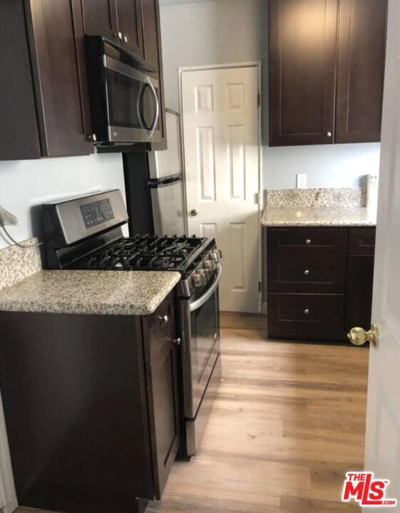 Building Photo - 1229 W 36th Pl