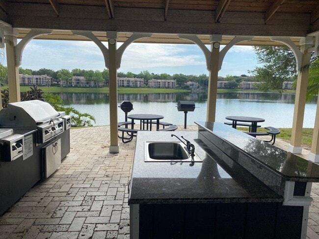Building Photo - Renovated Pool view 1 Bedrm Tradewinds Con...