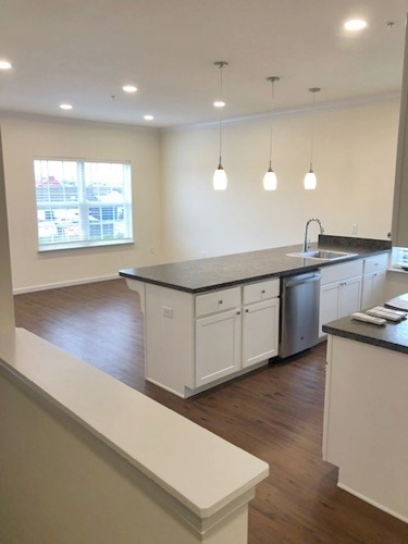 Sala de estar y cocina - East Breeze