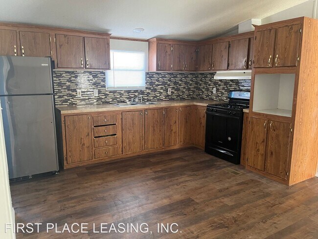 Building Photo - 3 br, 2 bath House - 1512 S. Avenue E Pl