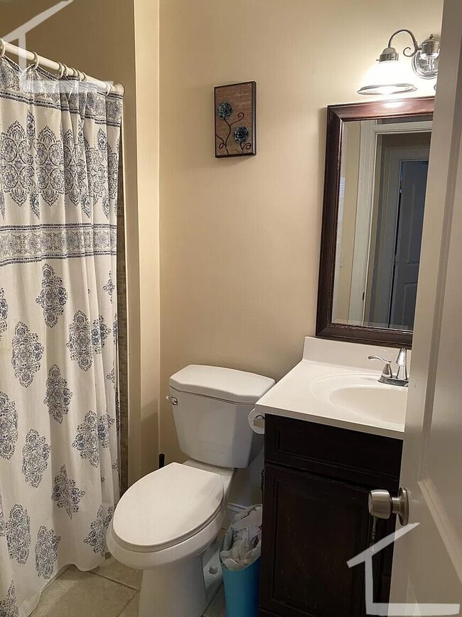 Building Photo - Large Renovated Unit in JP. Porch, Laundry...