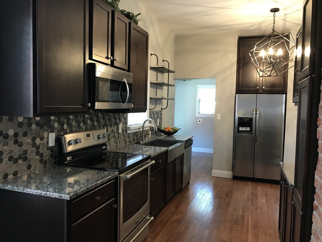 Primary Photo - Large Renovated Home Located in the Heart ...