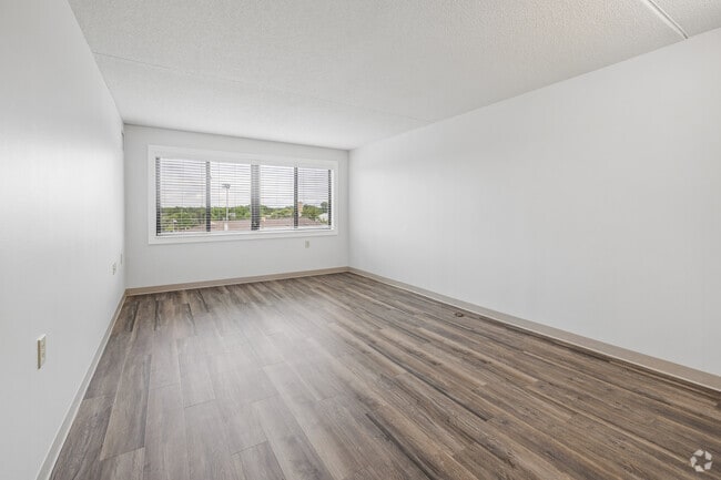 2BR, 1BA - 782SF - Living Room - Como by the Lake Senior Apartments