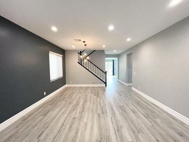 Building Photo - Welcome to a stunning 4-bedroom, 3-bath Home