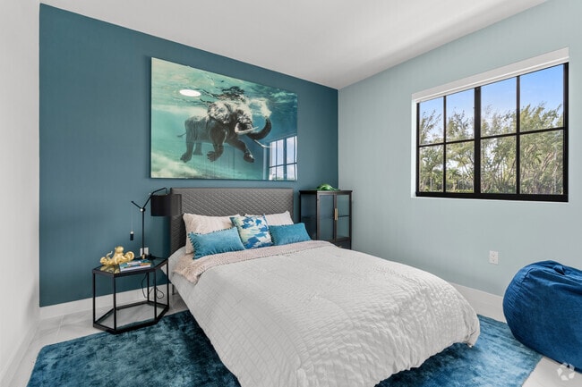 2BR, 2BA - 890SF - Bedroom - Flamingo Village