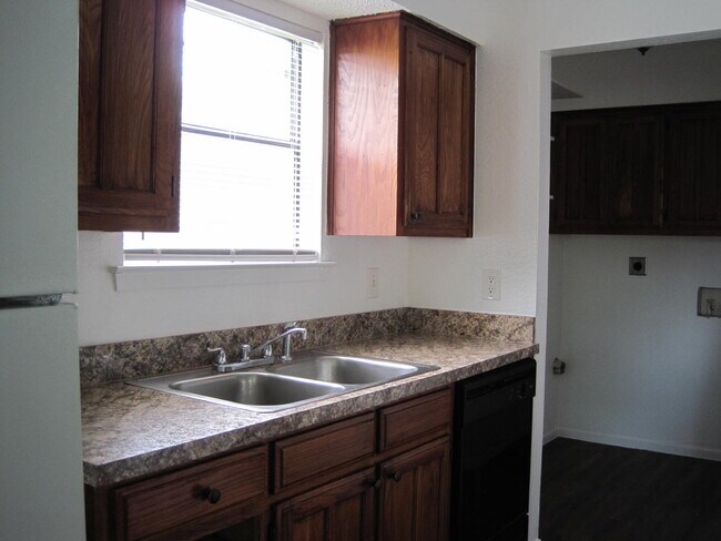 Kitchen with Laundry Room - 7620 John T White Rd