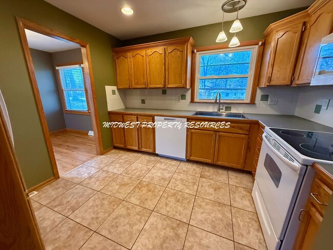 Building Photo - Charming 3 Bedroom Home with Finished Lower Level, Fenced Yard & 1-Car Garage