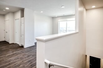 Living Room and Stairs to Unit - Arno at Coventry