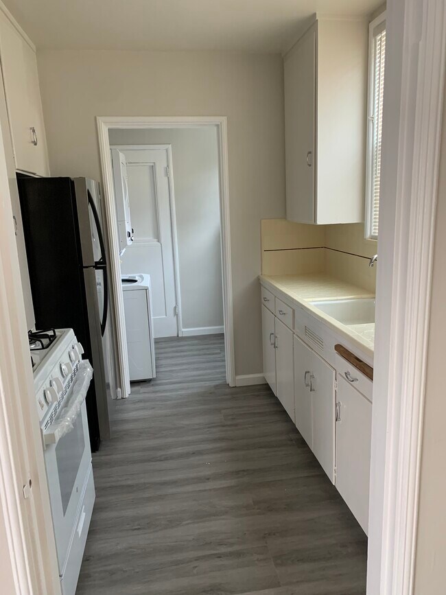Kitchen with refrigerator and new stove - 226 Bristol Blvd