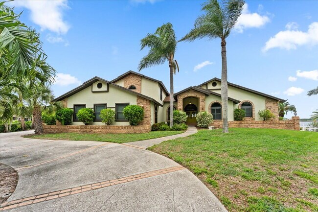 Building Photo - RENT THIS EXTRAORDINARY WATERFRONT HOME