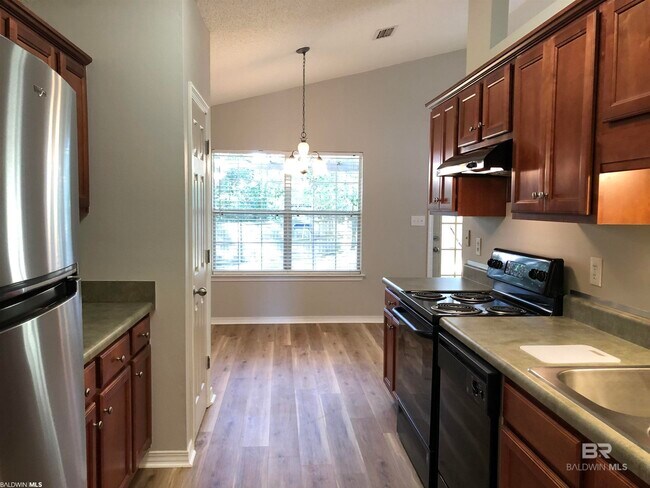 Building Photo - 9839 Hollowbrook Ave