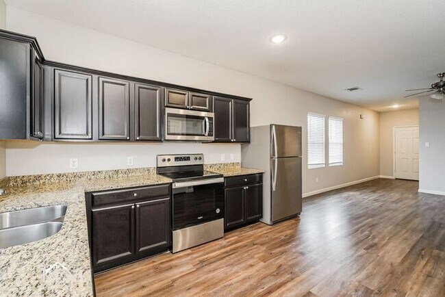 Foto del edificio - 6202 Old Bridge Way