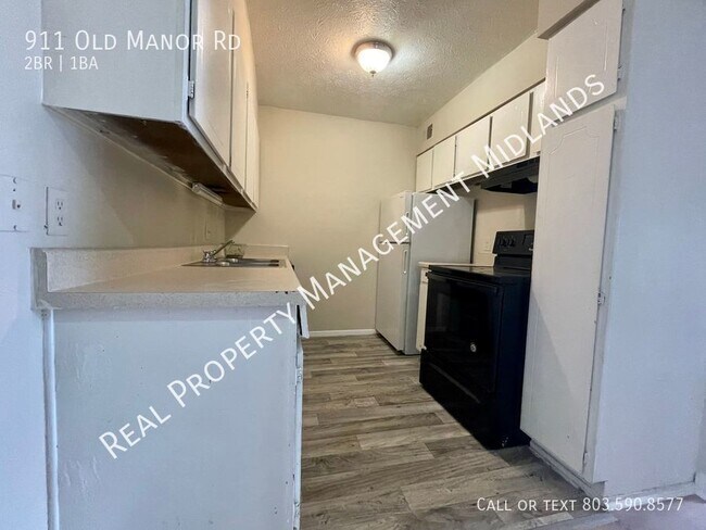 Foto del edificio - 2 Bedroom Condo in a Gated Community