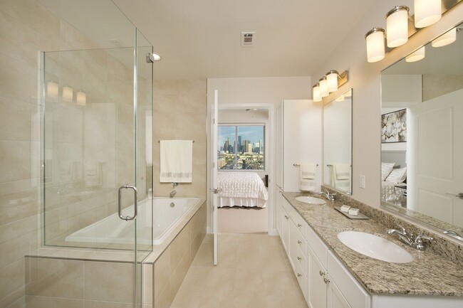 Master bath with luxurious oversized oval tub. - The Sovereign at Regent Square