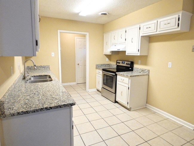 Building Photo - 6089 Shade Tree Dr