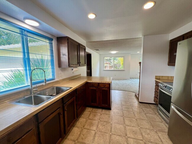 Building Photo - Spacious Home with Outbuildings on 2.3 Acres